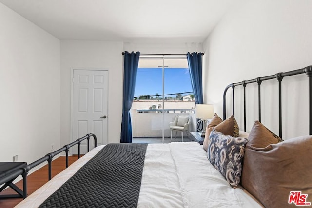 bedroom featuring hardwood / wood-style flooring