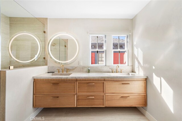 bathroom featuring vanity and tile patterned flooring