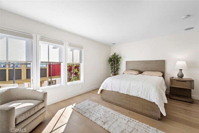 bedroom featuring light wood-type flooring