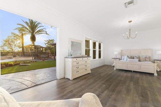 bedroom featuring ornamental molding, dark hardwood / wood-style flooring, a notable chandelier, and access to outside