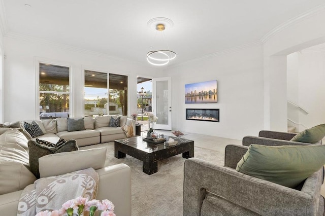 living room featuring crown molding