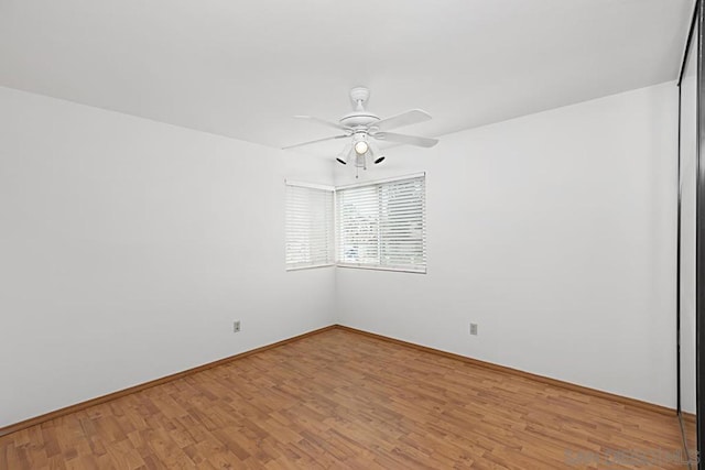 unfurnished room featuring ceiling fan and light hardwood / wood-style floors