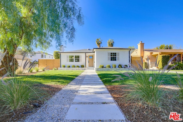 view of front of property with a front yard