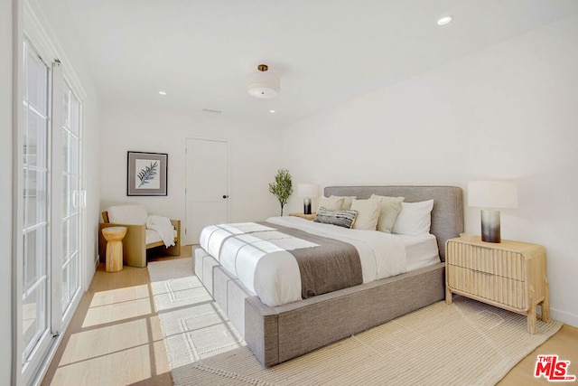 bedroom featuring hardwood / wood-style flooring