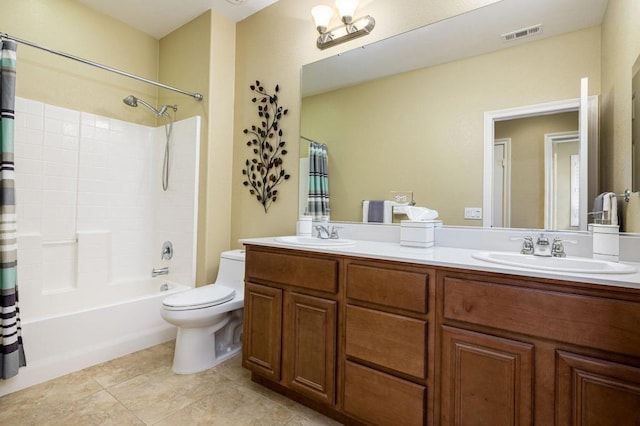 full bathroom with shower / tub combo, vanity, and toilet