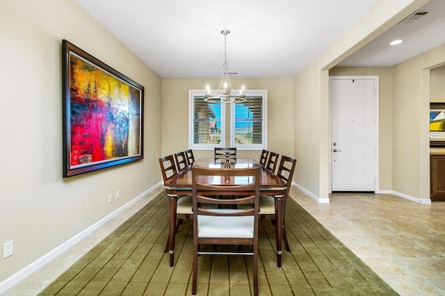 dining area with a chandelier