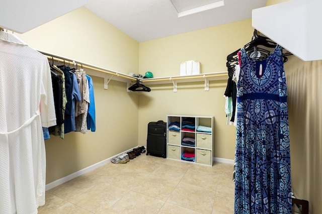 spacious closet with tile patterned flooring