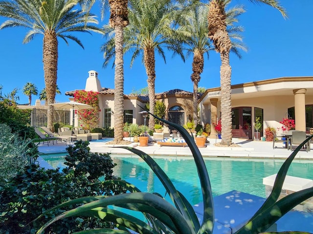 view of pool with a patio area