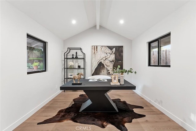 home office featuring lofted ceiling with beams and wood-type flooring