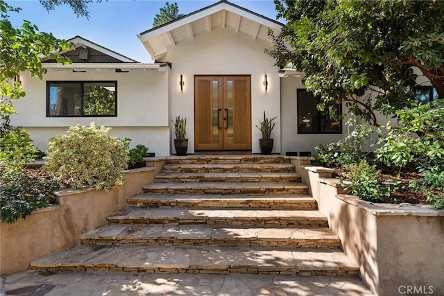 doorway to property featuring french doors