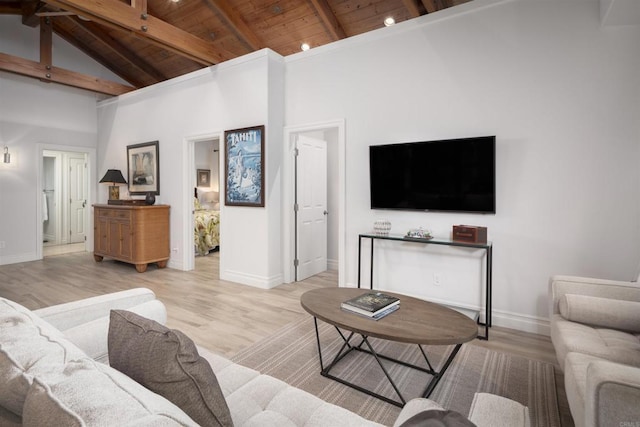 living room featuring high vaulted ceiling, wooden ceiling, beamed ceiling, and light hardwood / wood-style flooring