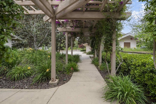 view of property's community featuring a pergola