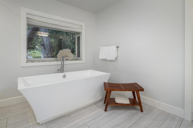 5041 El Secreto, Rancho Santa Fe, CA 92067 - bathroom featuring baseboards and a soaking tub