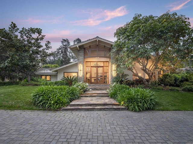 5041 El Secreto, Rancho Santa Fe, CA 92067 - view of front of home with a yard, stucco siding, and stone siding