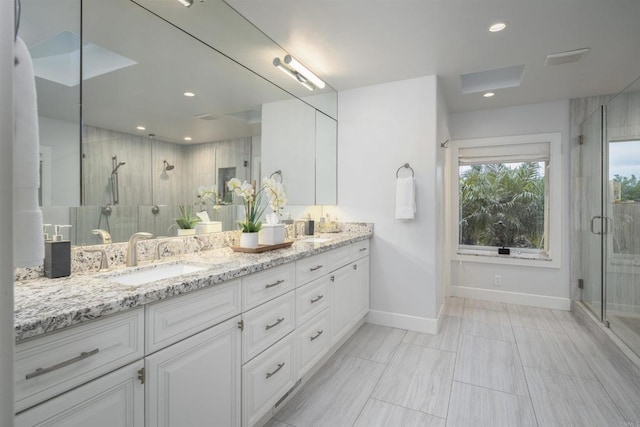 5041 El Secreto, Rancho Santa Fe, CA 92067 - full bathroom featuring baseboards, double vanity, a shower stall, and recessed lighting