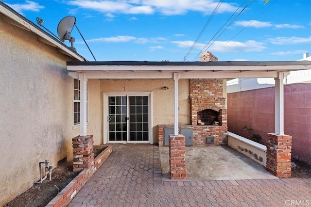 view of patio / terrace with a fireplace