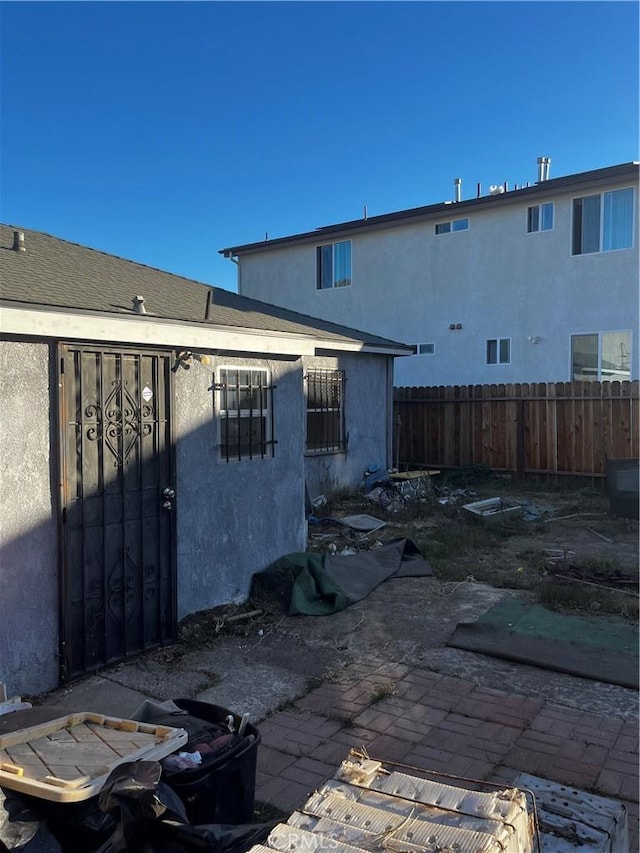 rear view of house with a patio