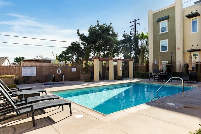 view of pool featuring a patio