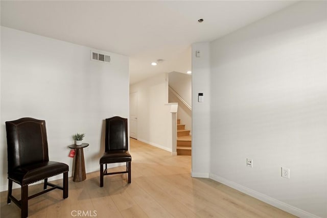 living area featuring light hardwood / wood-style floors