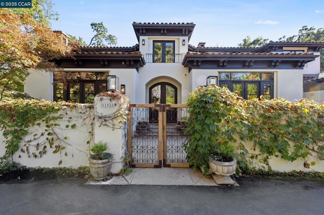 view of gate with french doors