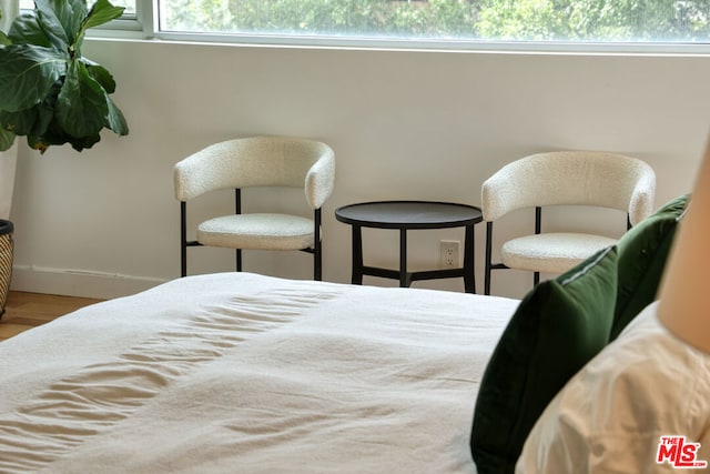 bedroom with wood-type flooring