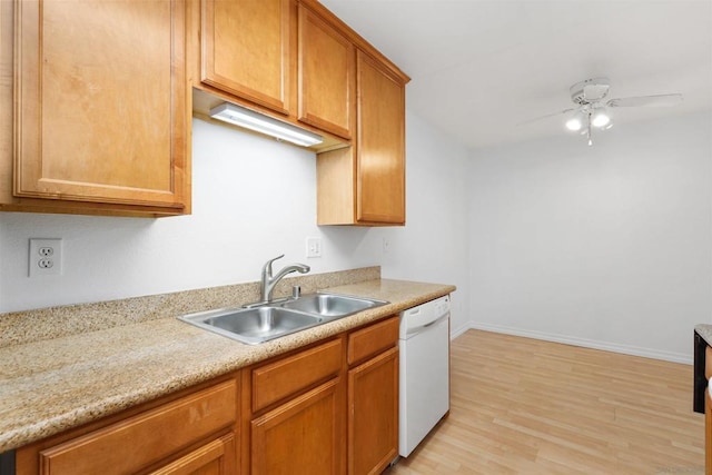 kitchen with light wood-type flooring, ceiling fan, dishwasher, and sink