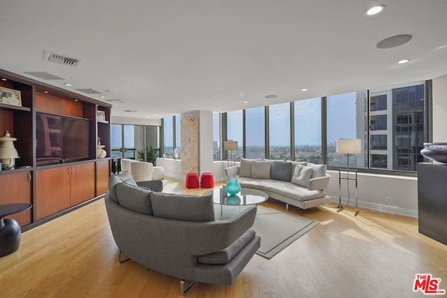 living room featuring light wood-type flooring