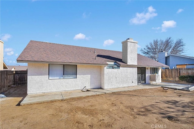 rear view of house featuring a patio area