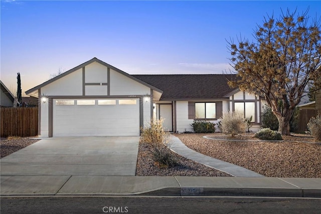 single story home featuring a garage