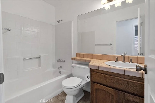 full bathroom with shower / bathing tub combination, tile patterned floors, vanity, and toilet