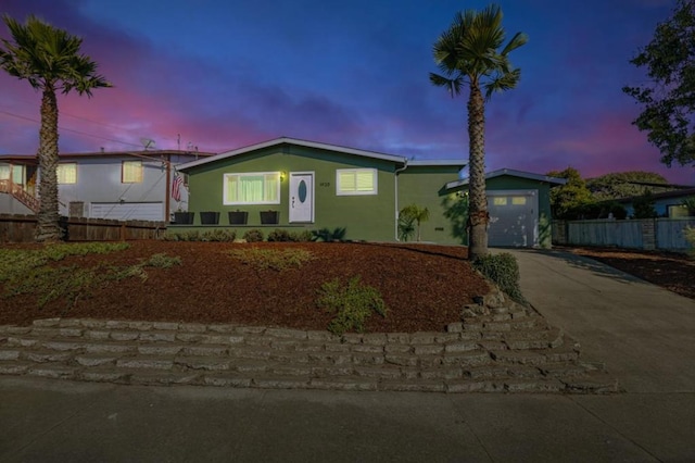 view of front of home featuring a garage