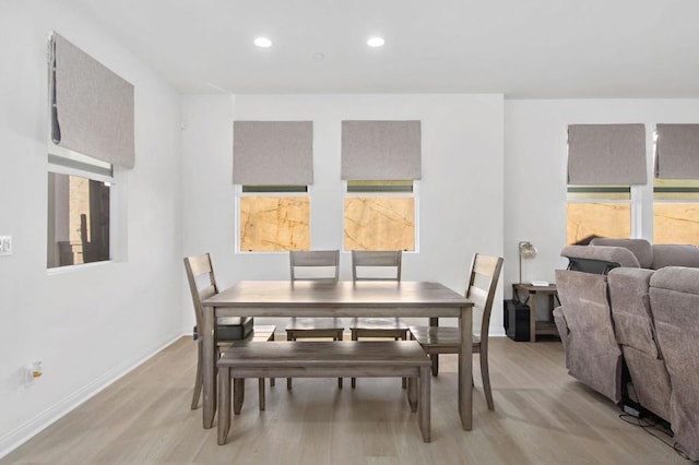 dining room with light hardwood / wood-style flooring