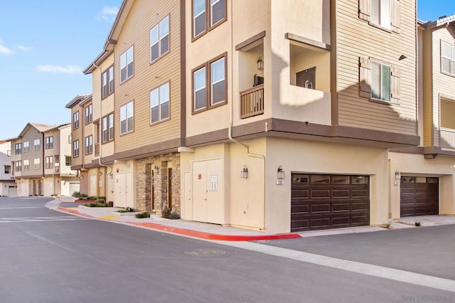 view of building exterior featuring a garage