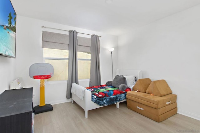 bedroom featuring light hardwood / wood-style floors