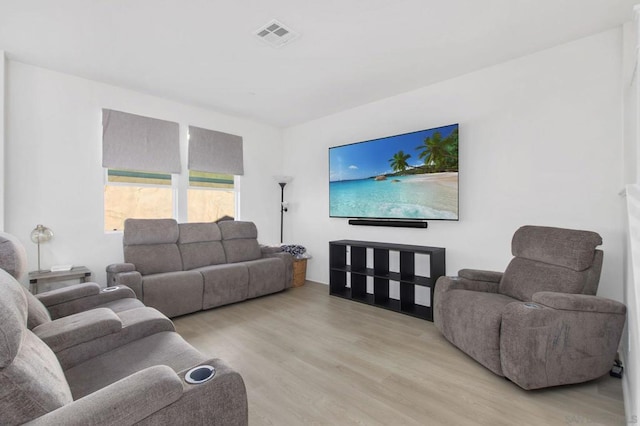 living room with light hardwood / wood-style floors