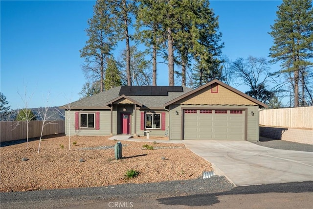 ranch-style house featuring a garage