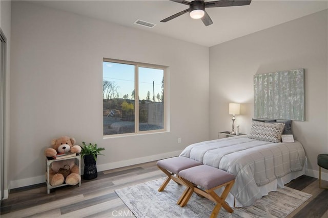 bedroom featuring ceiling fan and hardwood / wood-style floors