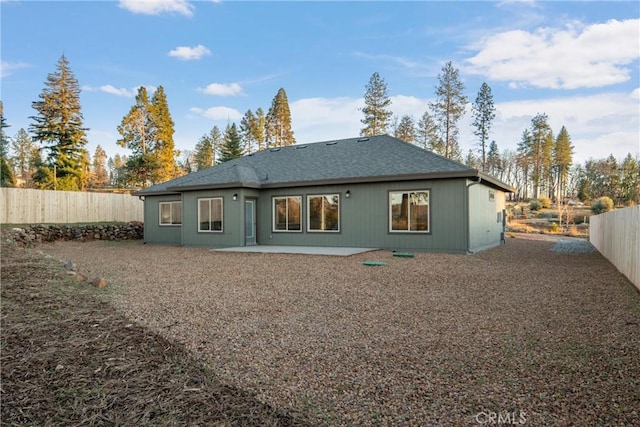 rear view of property with a patio area