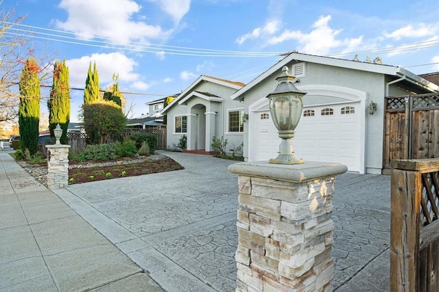 single story home featuring a garage