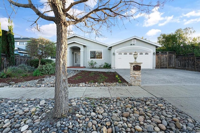 ranch-style home featuring a garage