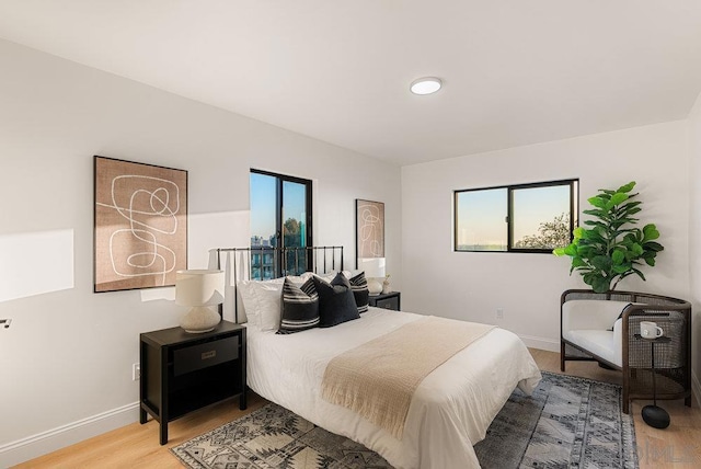 bedroom with wood-type flooring