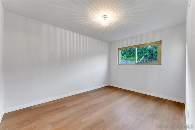 empty room featuring light hardwood / wood-style floors