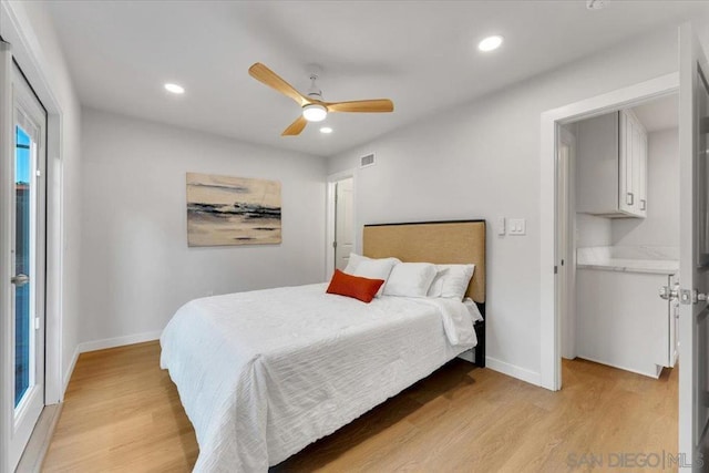 bedroom with light wood-type flooring, ceiling fan, and multiple windows