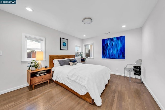 bedroom featuring hardwood / wood-style floors