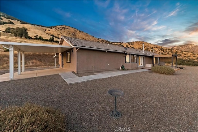 view of front of home with a mountain view