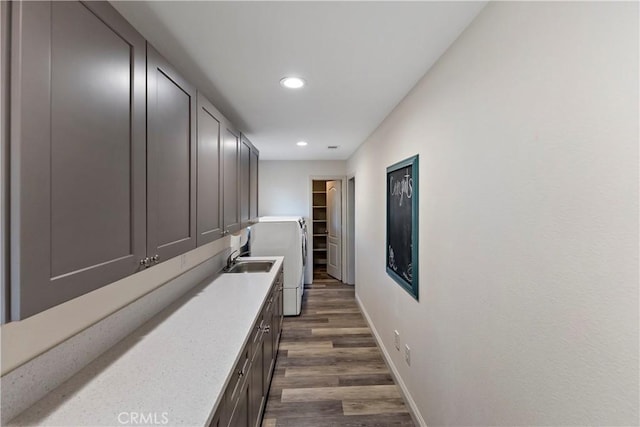 hall featuring dark hardwood / wood-style flooring and sink