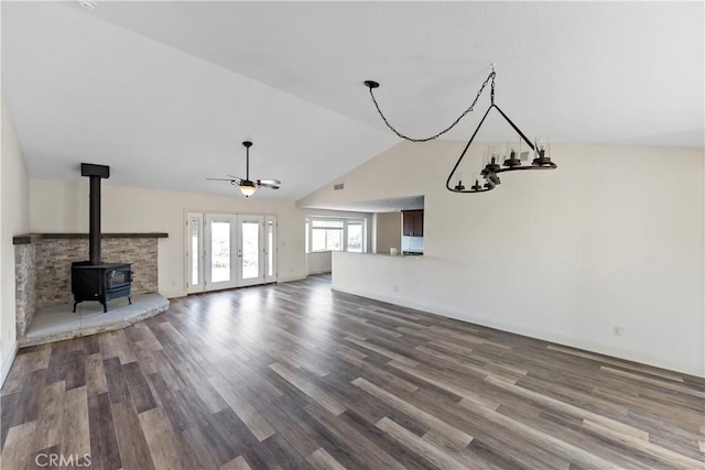 unfurnished living room with ceiling fan, lofted ceiling, french doors, and hardwood / wood-style flooring