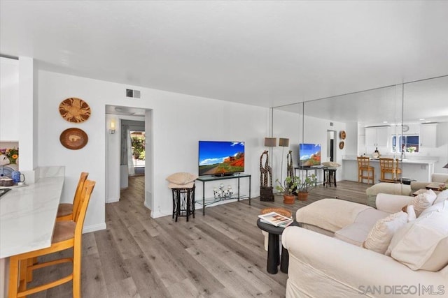 living room with light wood-type flooring