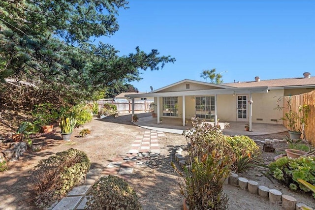 rear view of house featuring a patio area