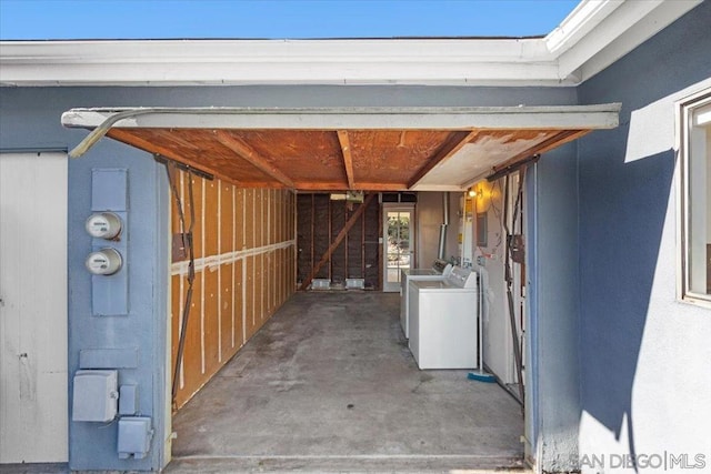 exterior space featuring washing machine and clothes dryer